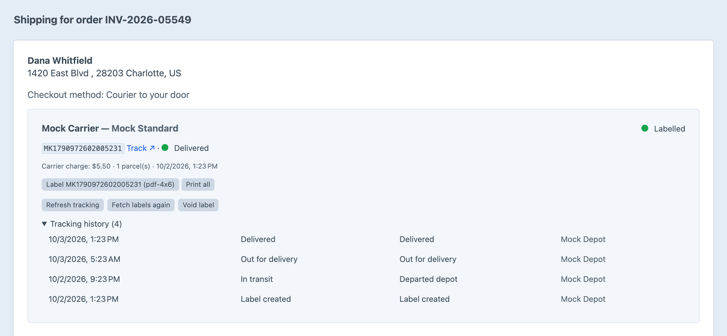 The Carrier shipment screen for an order showing a delivered Mock Carrier shipment with its tracking number, charge, label download, Refresh, Reprint and Void buttons, and a four-scan tracking history